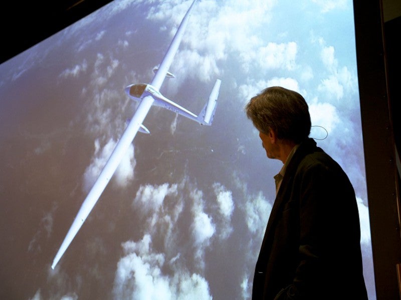 Klaus Ohlmann shows Stemme in which he conquered Mt. Everest.