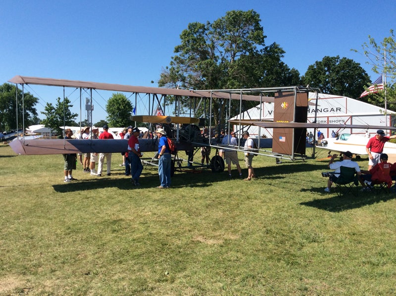 You can find the "B" in front of the Vintage Hangar, next to the Red Barn.