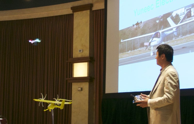 Yuneec CEO Tian Yu showed off drone, skateboard, ultralight airplane and LSA.