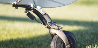 Aircraft tailwheel springs and linkage
