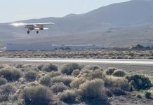 Paul Dye takes off in the NX Cub from his home field in Nevada.