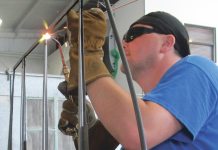 Running With Scissors Aircraft welder using oxy-acetylene to weld an aircraft component.