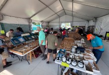 First Stop—Stock Up! B&B Aircraft Supply tent