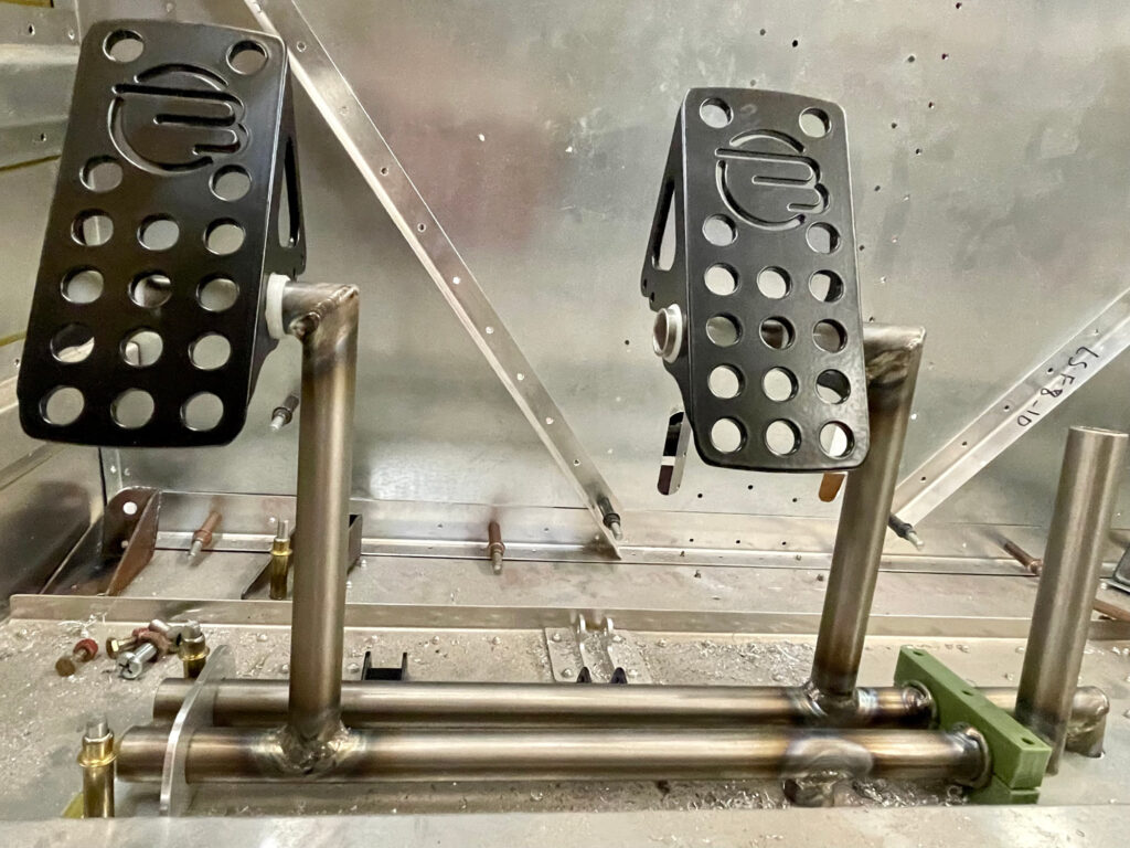Titanium rudder pedal assembly nearing completion with the
Beringer RuddAir pedals.