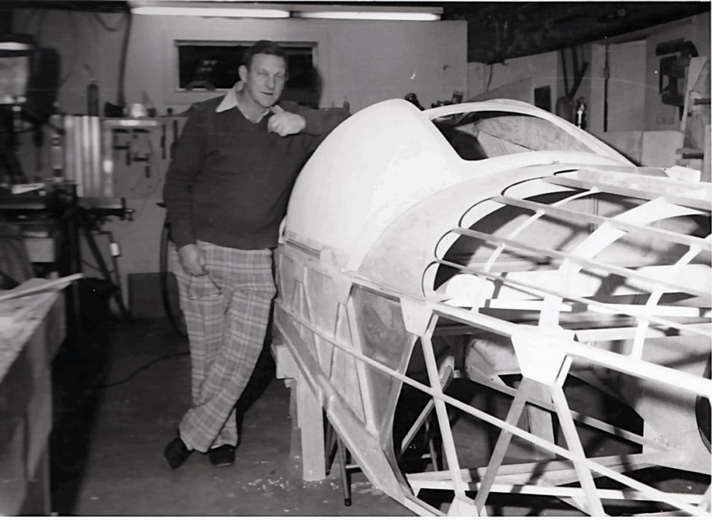 Colin Walker next to his Volmer VJ-22 Sportsman fuselage during construction.