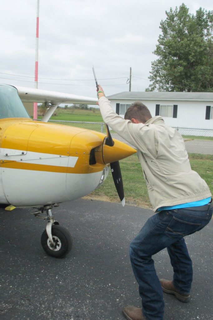 Having the jacket zipped up is safer than leaving it loose. Always be standing on solid surfaces while propping.